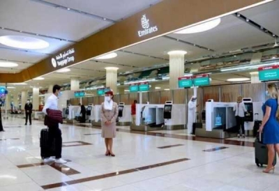 مطار دبي يستخدم ماسحة العين للمسافرين بدلًا من جوازات السفر