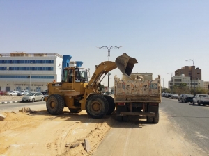 تطوير وانارة ورصف شوارع وإزالة عقارين بحي السويس